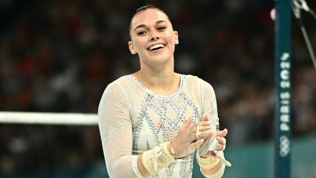 Looking sharp: Italian gymnastics silver medalist sponsored by parmesan cheese